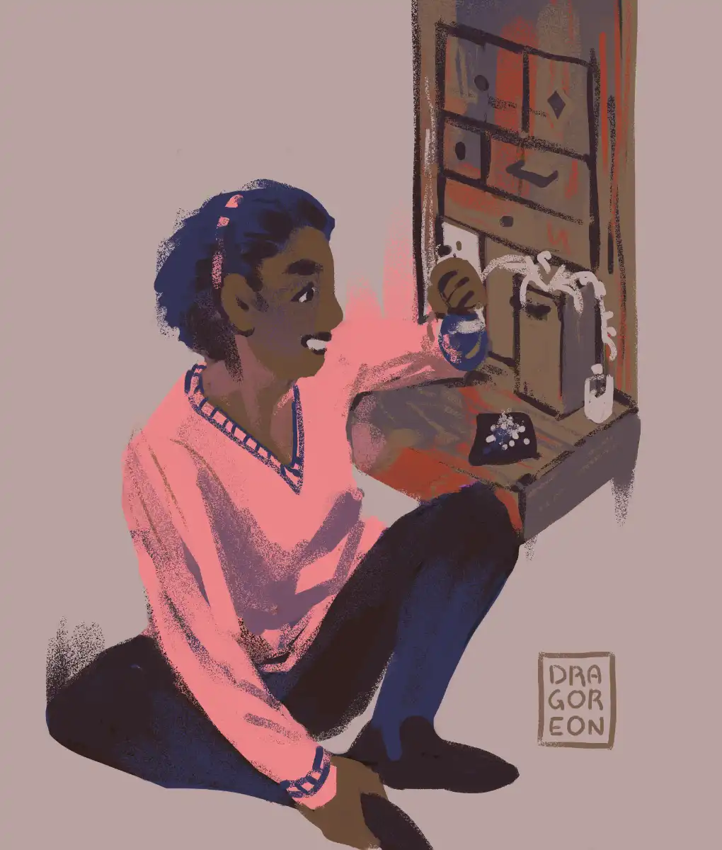A girl sitting on the floor near an antique drawer is holding a round potion phial. She is smiling while looking at the indigo liquid in it. The girl is also wearing a pink sweater, looking very comfortable.
